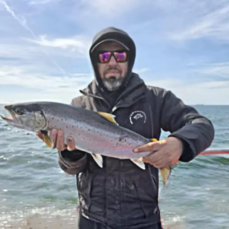 Tarek learning shore fishing for sea trout in Skåne